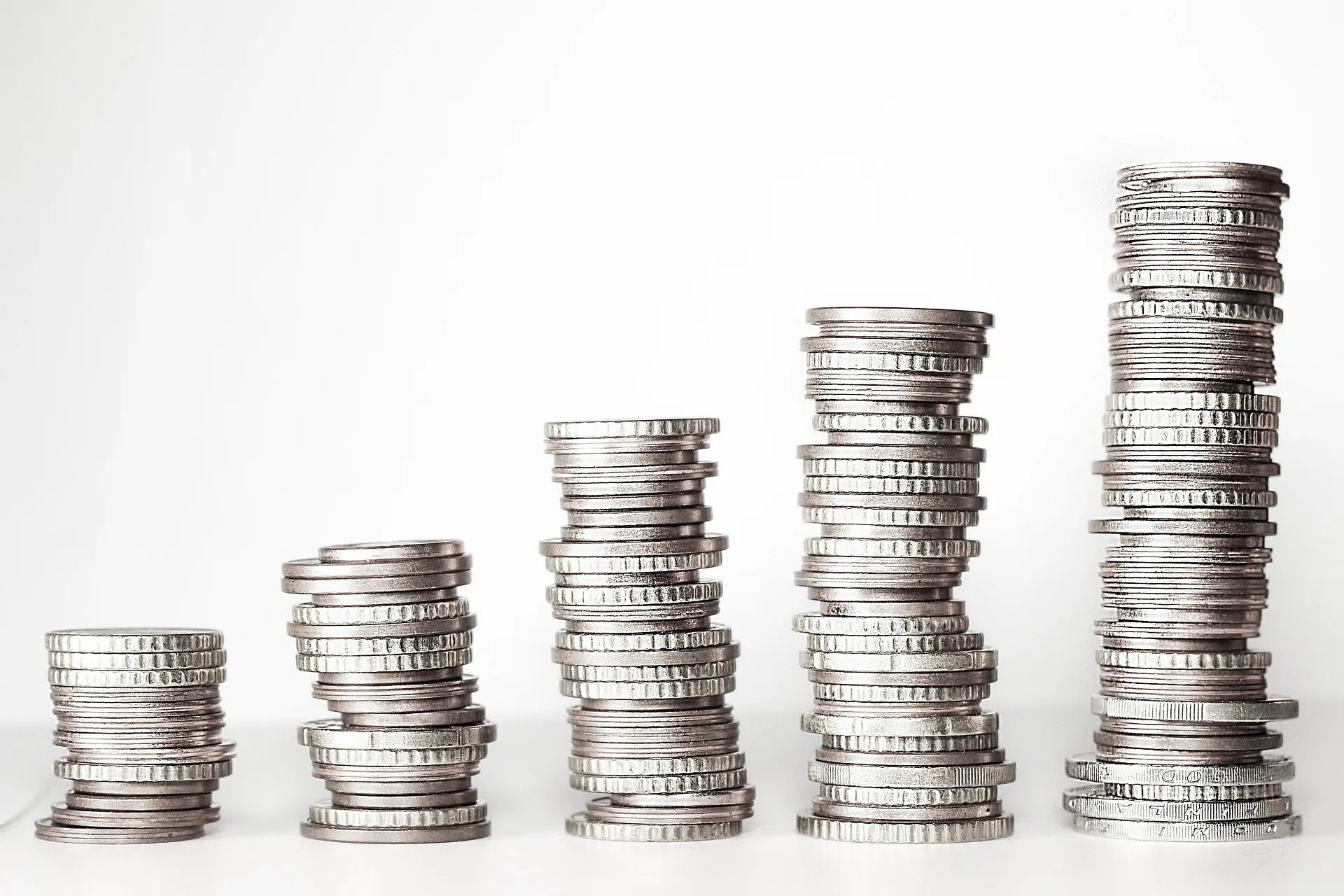Stacks of coins representing value in a local student marketplace